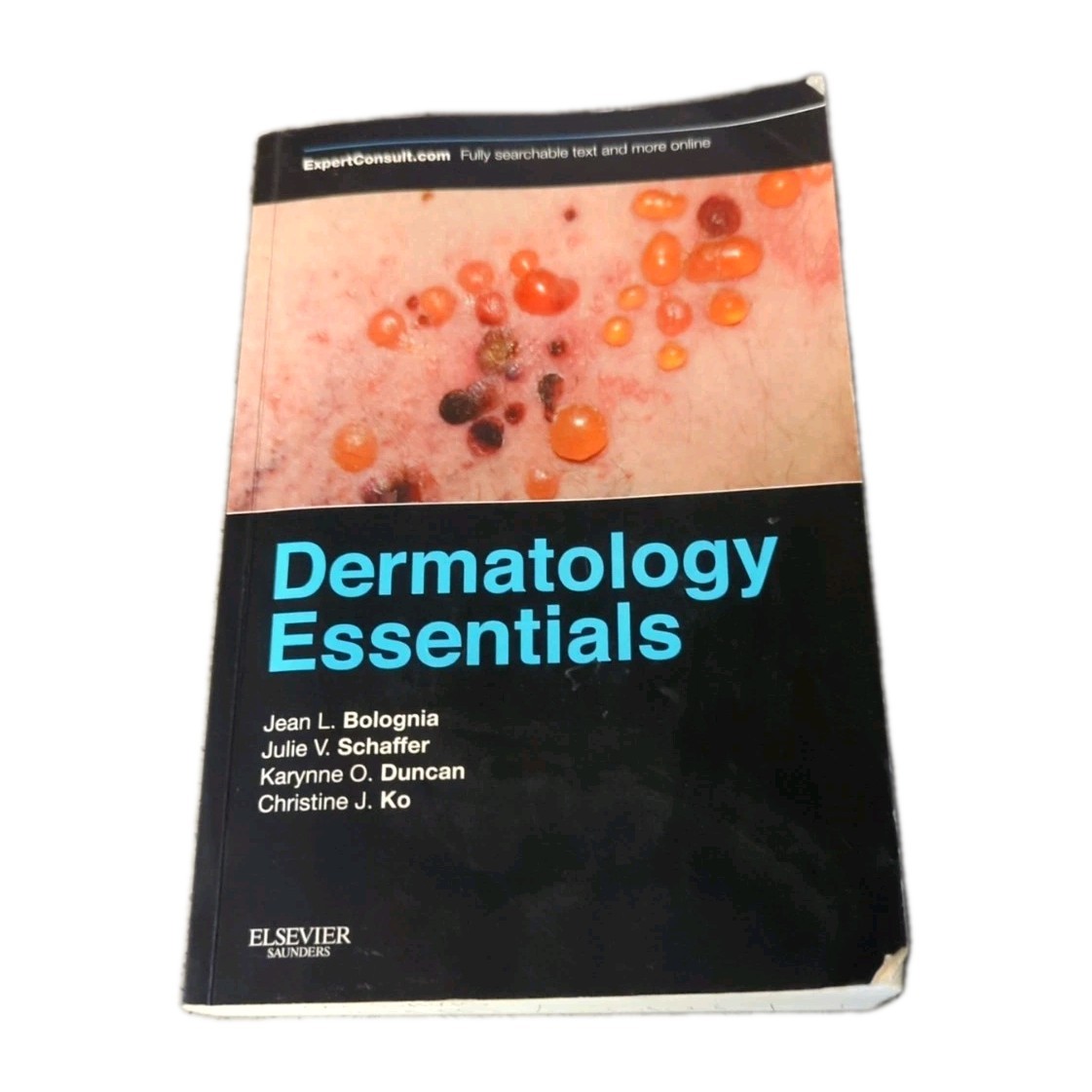 Dermatology Essentials PB by J.Bolognia J.Schaffer **SEE PHOTOS**