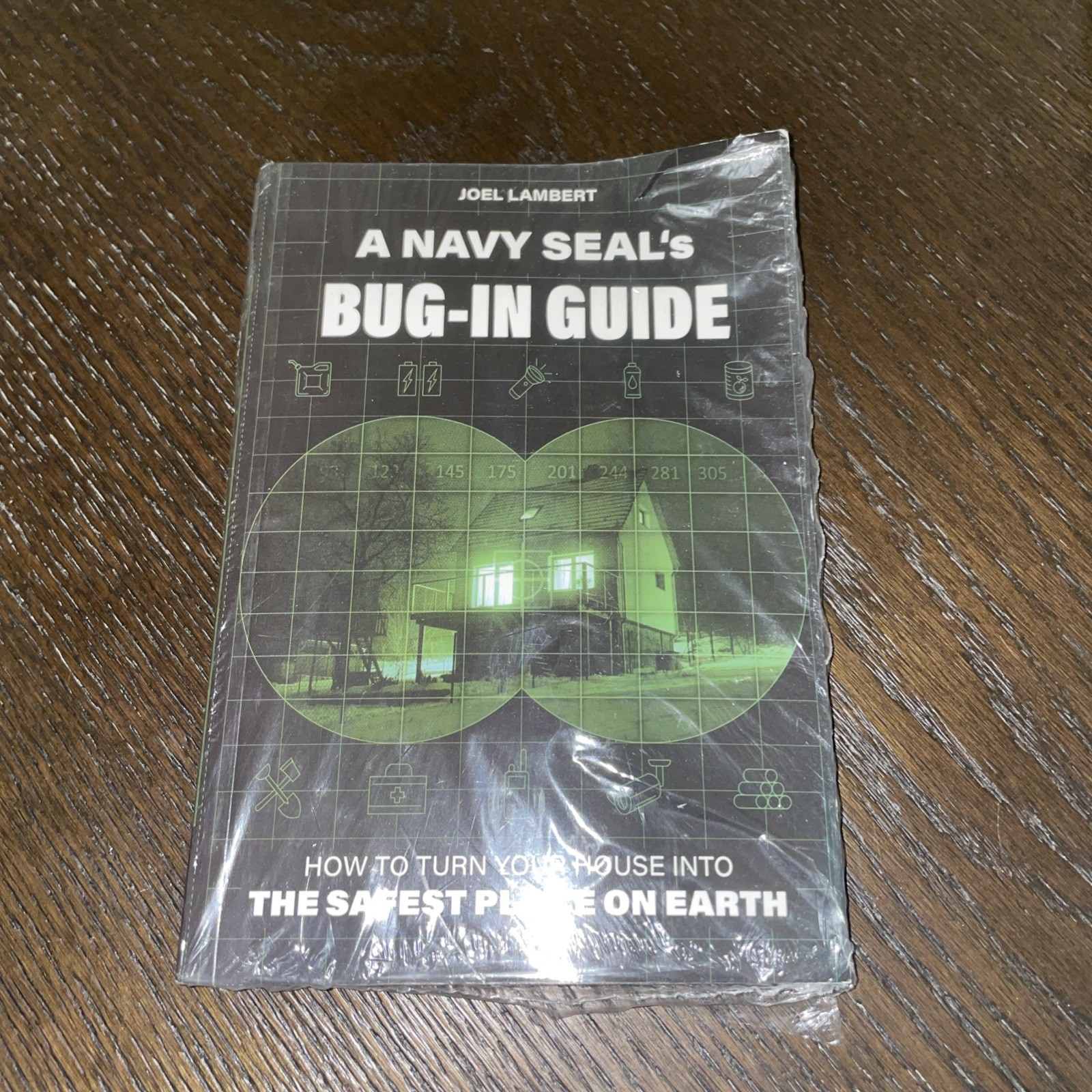 A Navy Seals BUG IN GUIDE SEALED but bent